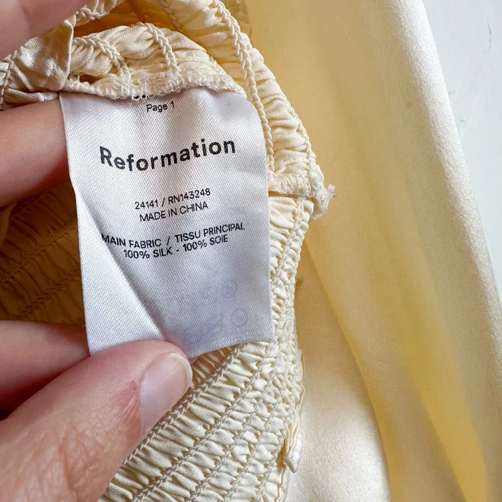 Reformation | Chamomile 100% Silk Smocked Satin Long Sleeve Top in Custard
